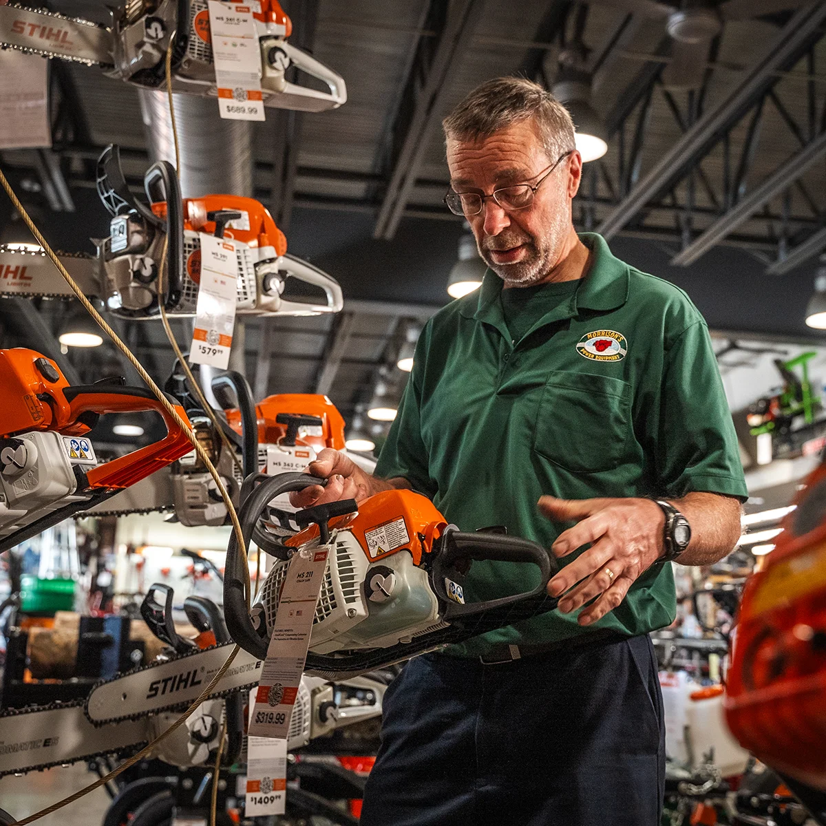 Morrison's Staff assisting customer with equipment purchase